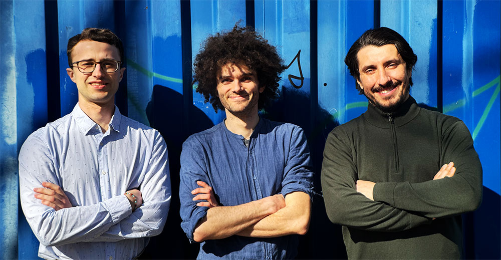 Gruppenfoto von drei Männern