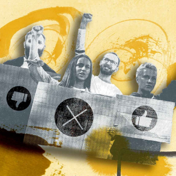 Gruppe an Menschen die Plakate hochhalten 