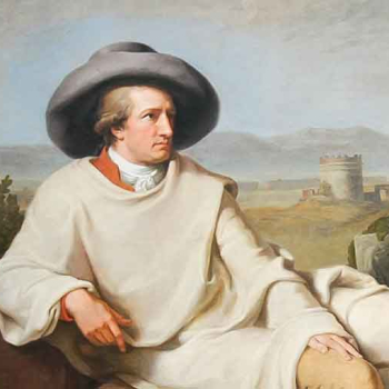 Das Bild zeigt das berühmte Gemälde "Goethe in der römischen Campagna" von J.W. Tischbein. Goethe, mit Hut und im weißen Reisemantel sitzt auf einem efeuumrankten, antiken Ruinenfragment, neben ihm ein antikes Relief.